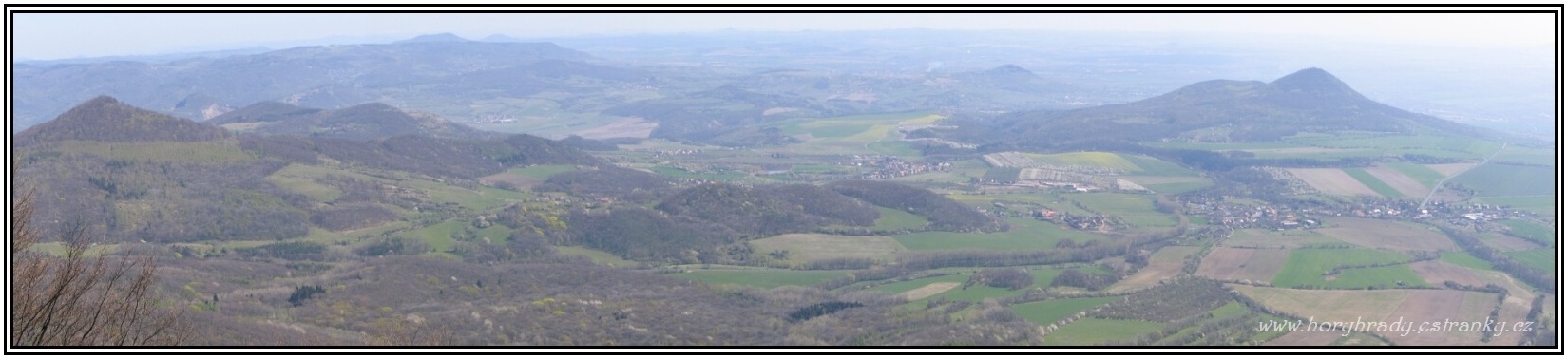 Milešovka_panorama_Kletečná_směr_Ještěd-Krkonoše_2007